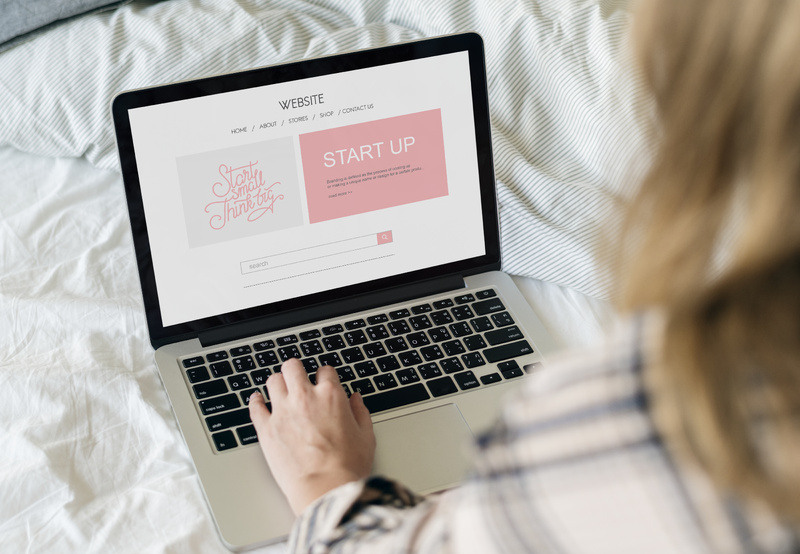 Woman navigates website with a sign up form 