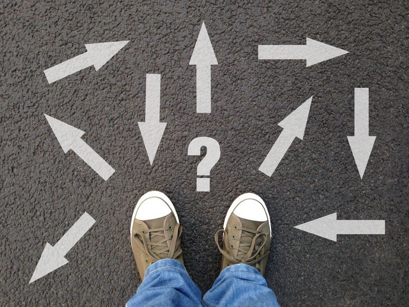 Graphic shows arrows pointing in different directions on the floor, with a person wondering where to move next